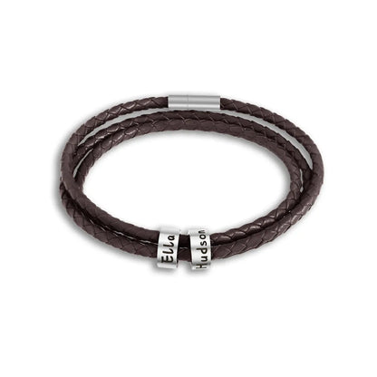 Pulsera de cuero trenzado con anillos de acero personalizados.