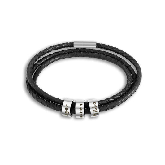Pulsera de cuero trenzado con anillos de acero personalizados.